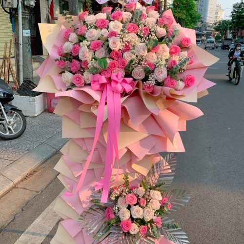 Kệ hoa hồng phấn nơ hồng khai trương Đà Nẵng